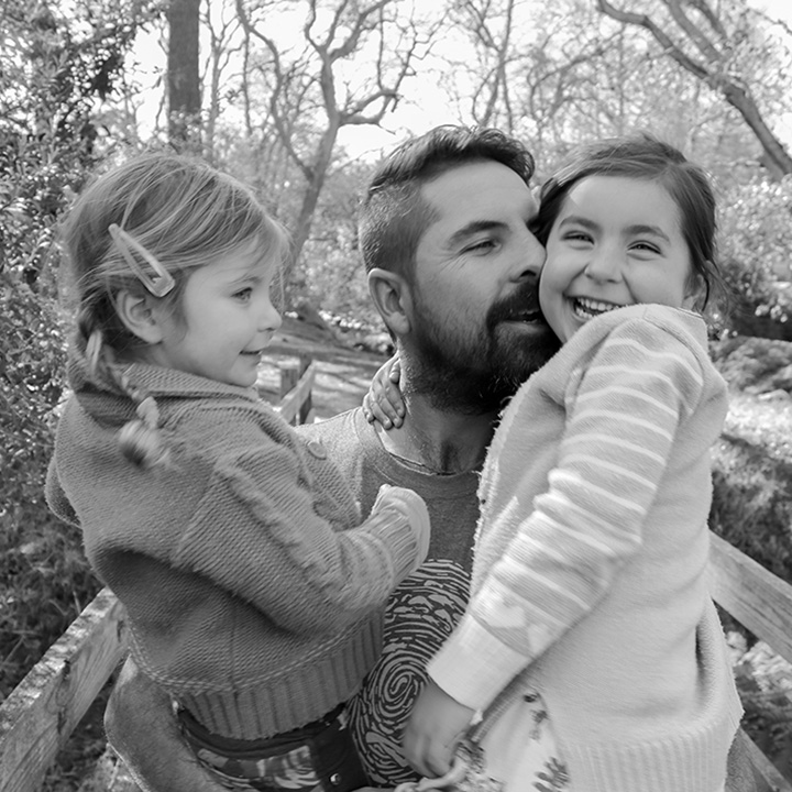 Ross with his two daughters